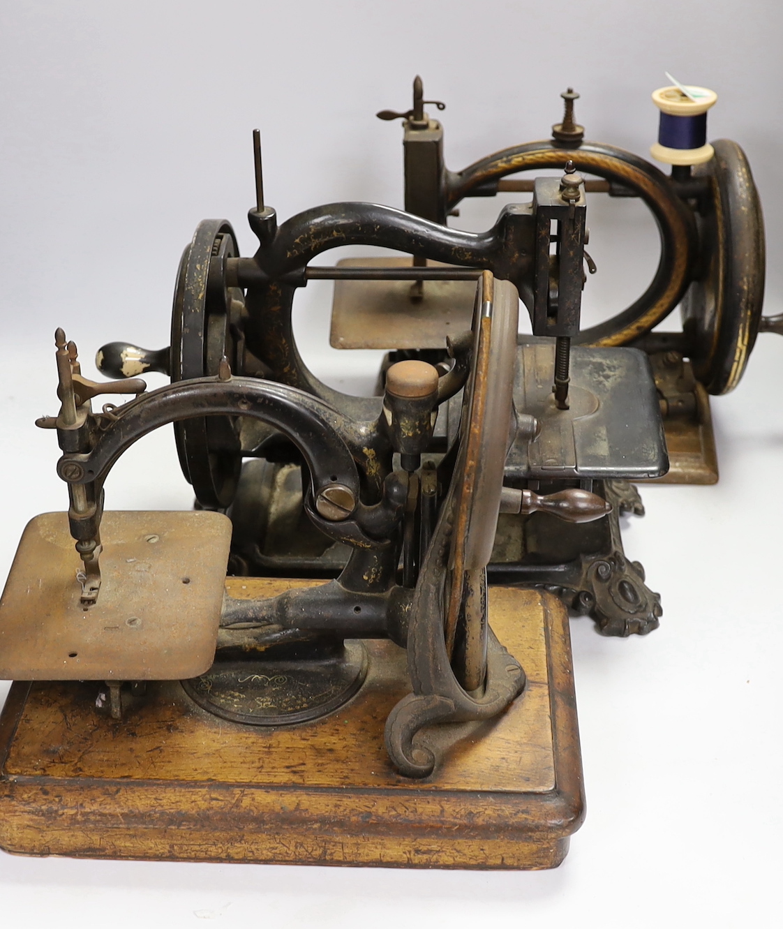 Three Victorian sewing machines, including Willcox and Gibbs and Smith and co, The Seymour patent